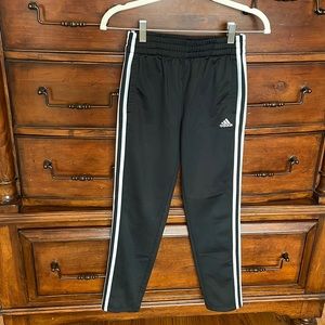 Adidas track pants with stripe. Unisex. Medium 10-12. Black. EUC.